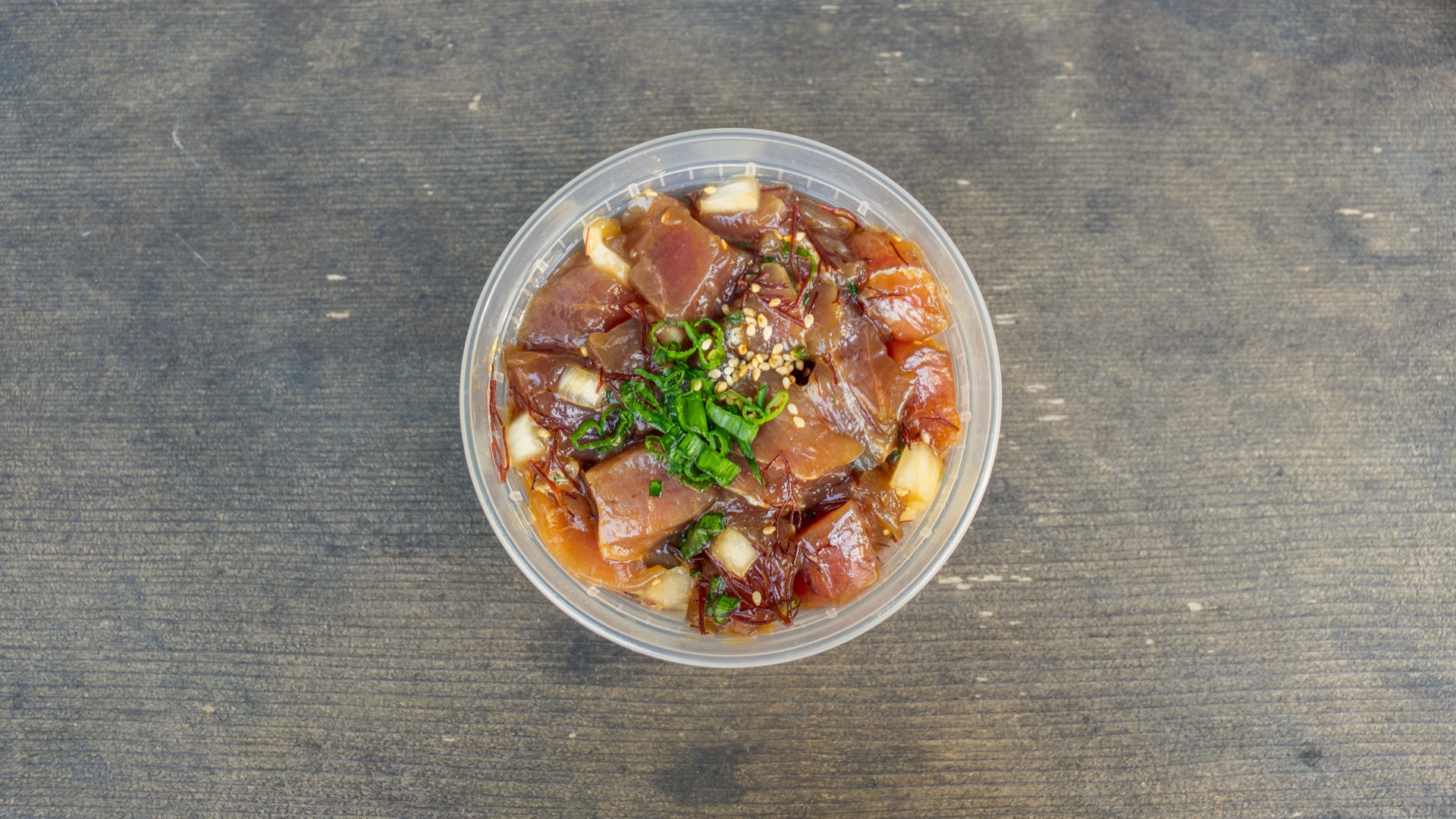 shoyu poke — ahi tossed in soy sauce, sesame and ogo seaweed